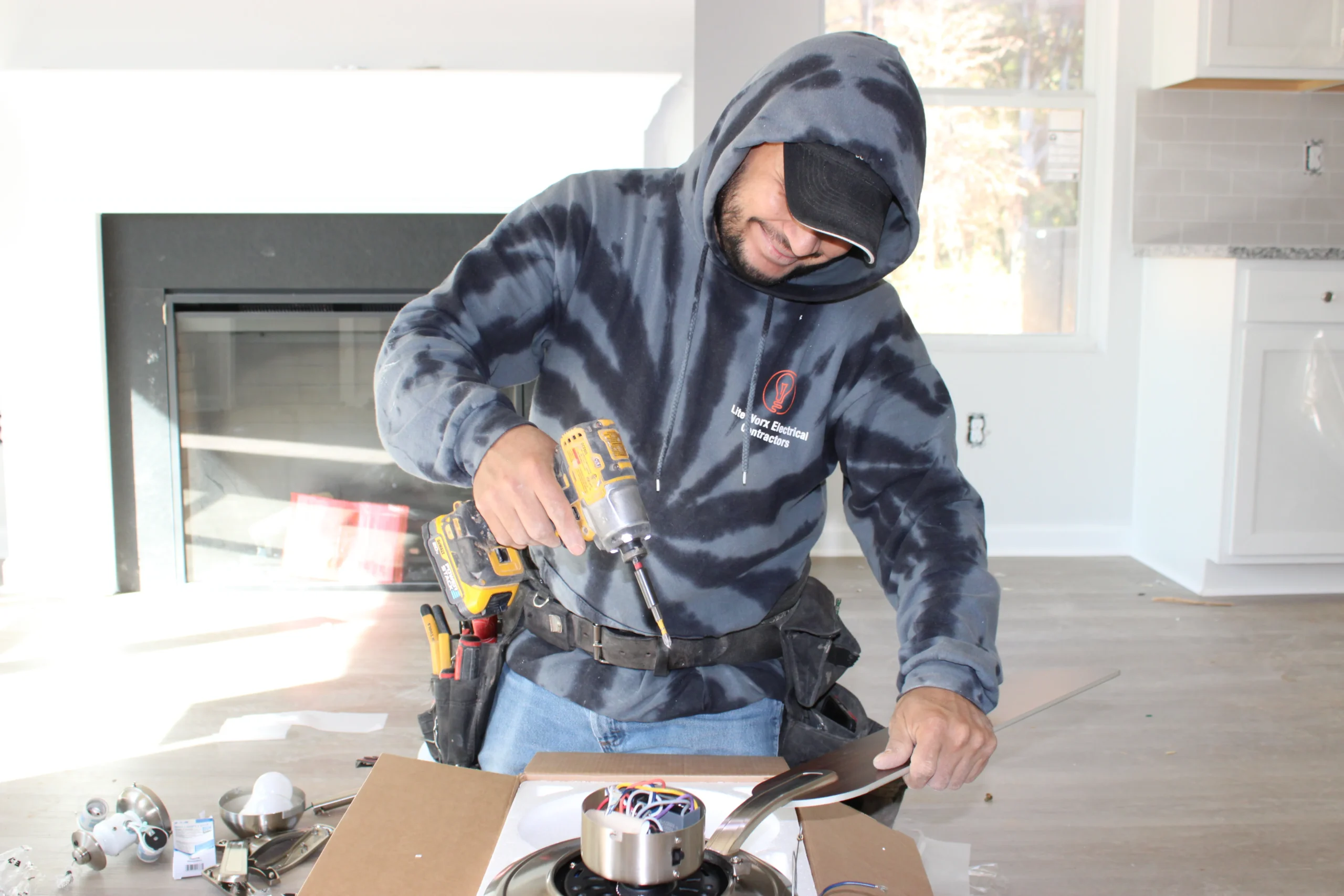 Electrician Installing ceiling fan Electrician Installing ceiling fan