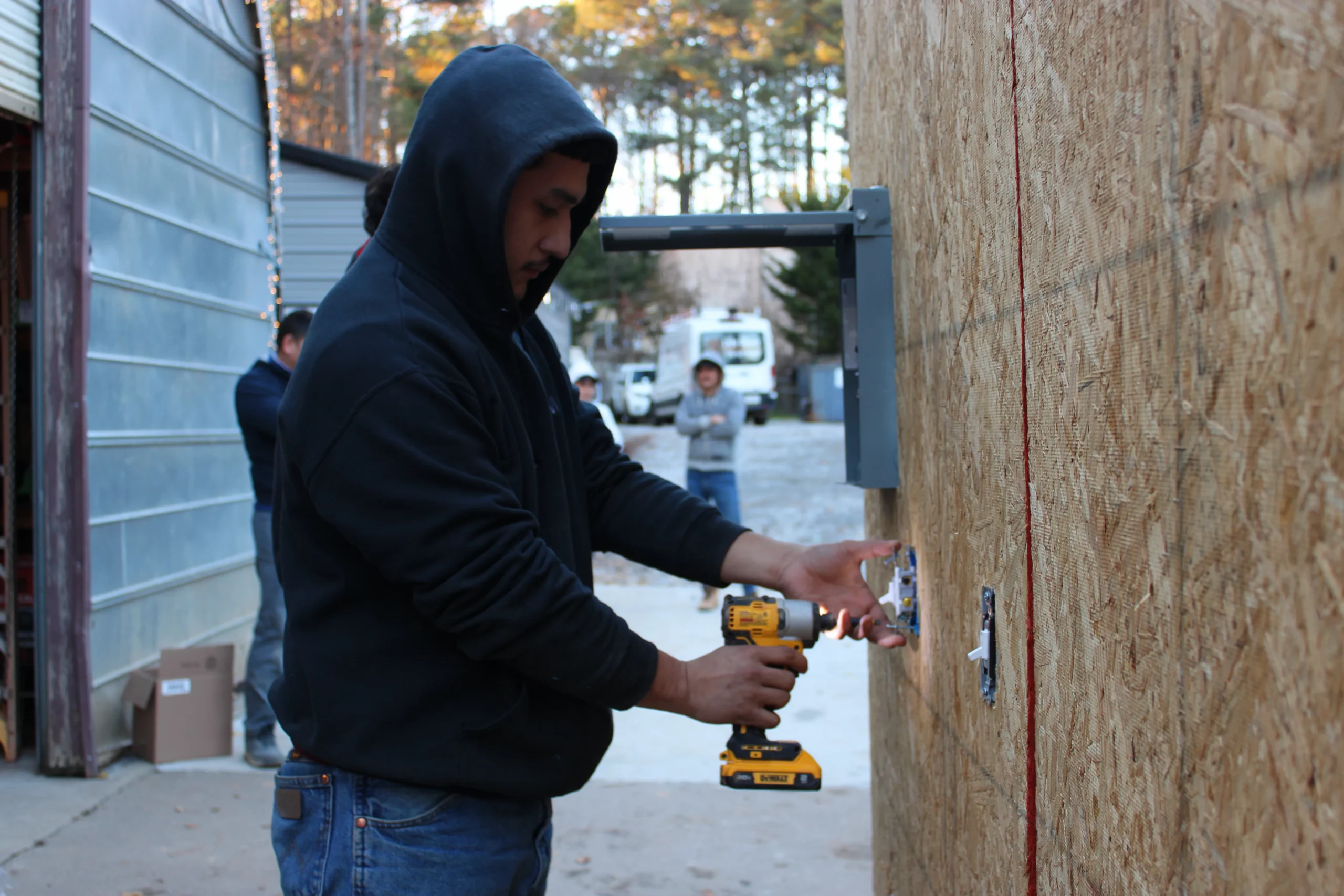 Electrician using our training wall Electrician using our training wall
